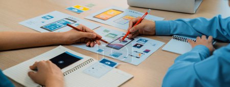 Photo for Panorama banner of startup company employee planning on user interface prototype for mobile application or website in office. UX UI designer brainstorm user friendly interface plan. Synergic - Royalty Free Image