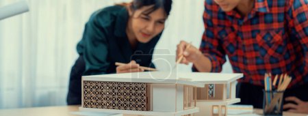 Photo for Architect engineer team meeting discussion and analysis house construction. Professional interior designer brainstorm about house structure decide. Creative decide and team work concept. Burgeoning. - Royalty Free Image