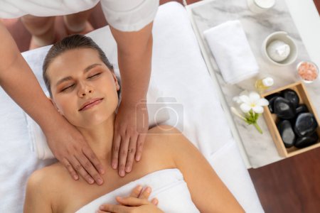 Photo for Panorama top view woman customer enjoying relaxing anti-stress spa massage and pampering with beauty skin recreation leisure in day light ambient salon spa at luxury resort or hotel. Quiescent - Royalty Free Image
