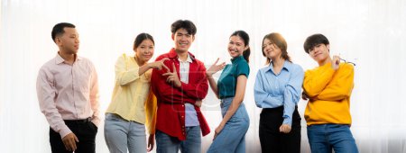 Photo for Panoramic banner young happy asian startup company employee wearing colorful casual wear stand in line together symbolize creative teamwork, job employment, HR agency recruitment. Synergic - Royalty Free Image