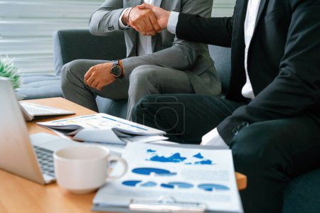 Photo for Businessman handshake with another businessman partner in modern workplace office. People corporate business deals concept. uds - Royalty Free Image