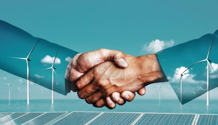Photo for Double exposure graphic of business people handshake over wind turbine farm and green renewable energy worker interface. Concept of sustainability development by alternative energy. uds - Royalty Free Image