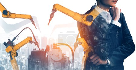 Photo for XAI Mechanized industry robot arm and factory worker double exposure. Concept of robotics technology for industrial revolution and automated manufacturing process. - Royalty Free Image