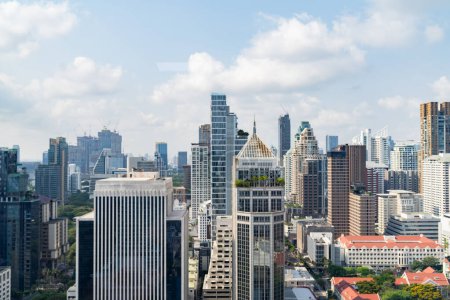 Photo for Closeup image of Bangkok cityscape. Modern cityscape surrounded with architectural building with day light and blue sky. Side view. Business background. Day light. Ornamented. - Royalty Free Image