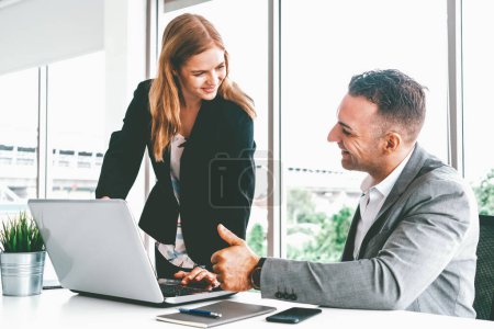 Photo for Businessman executive is in meeting discussion with a businesswoman worker in modern workplace office. People corporate business team concept. uds - Royalty Free Image