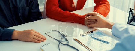 Photo for Couple attend fertility or medical consultation with gynecologist at hospital as family planning care for pregnancy while doctor and husband consoling young wife through appointment. Panorama Rigid - Royalty Free Image