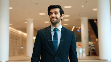 Photo for Portrait imaged of professional business man looking around at mall. Executive manager standing at mall while smiling with confident. Finding a job, decide to invest money, planing idea. Exultant. - Royalty Free Image