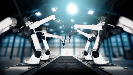 Foto de Brazo robot industrial mecanizado XAI para montaje en línea de producción de fábrica. Concepto de inteligencia artificial para la revolución industrial y el proceso de fabricación de automatización. - Imagen libre de derechos
