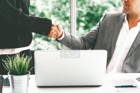 Photo for Businessman executive handshake with businesswoman worker in modern workplace office. People corporate business deals concept. uds - Royalty Free Image