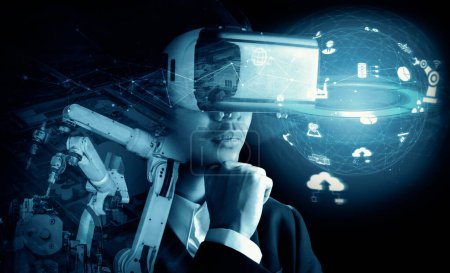 Foto de Tecnología XAI Future VR para el control de brazos de robot industrial mecanizado. Concepto de tecnología robótica para la revolución industrial y el proceso de fabricación automatizada. - Imagen libre de derechos