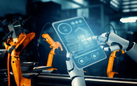 XAI Mechanisierte Industrieroboter und Roboterarme für die Montage in der Fabrikproduktion. Konzept der künstlichen Intelligenz für industrielle Revolution und Automatisierung des Fertigungsprozesses.