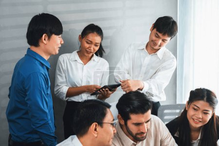 Photo for Group of diverse office worker employee working together on strategic business marketing planning in corporate office room. Positive teamwork in business workplace concept. Prudent - Royalty Free Image
