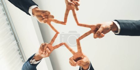 Photo for Business people collaborate business synergy and cooperation, join hand as star frame around empty blank hole copyspace for unity and teamwork for product advertise background.Panorama Shrewd - Royalty Free Image
