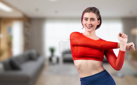 Photo for Athletic and sporty woman doing warmup and stretching before home body workout exercise session for fit physique and healthy sport lifestyle at home. Gaiety home exercise workout training concept. - Royalty Free Image