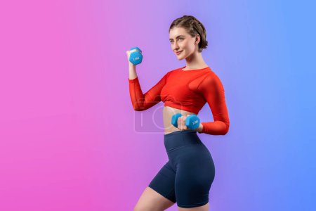 Photo for Full body length gaiety shot athletic and sporty woman with dumbbell for weight lifting as bodybuilding exercise in standing posture on isolated background. Healthy active and body care lifestyle - Royalty Free Image