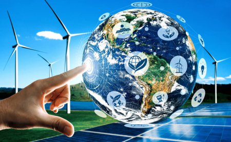 Concept of sustainability development by alternative energy. Man hand take care of planet earth with environmentally friendly wind turbine farm and green renewable energy in background. uds