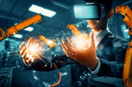 Foto de Tecnología XAI Future VR para el control de brazos de robot industrial mecanizado. Concepto de tecnología robótica para la revolución industrial y el proceso de fabricación automatizada. - Imagen libre de derechos