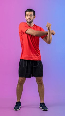 Photo for Full body length gaiety shot athletic and sporty young man with fitness warmup and stretching body for pre exercise posture on isolated background. Healthy active and body care lifestyle. - Royalty Free Image