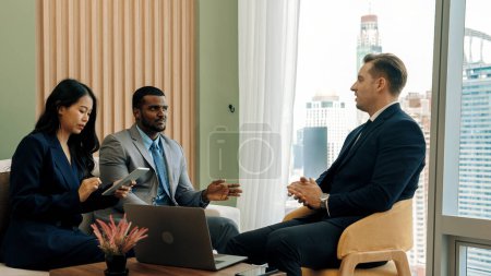 Photo for Ornamented office overlooking city skyline, diversity corporate professional discuss ambitious business expansion or strategic marketing. Financial advisor give consulting business insights and idea - Royalty Free Image