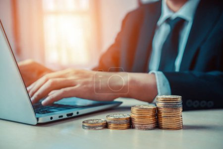 Photo for Businessman working with coin money currency. Concept of investment growth and money saving. uds - Royalty Free Image