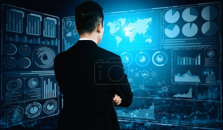 Photo for Big Data Technology for Business Finance Analytic Concept. Modern interface shows massive information of business sale report, profit chart and stock market trends analysis on screen monitor. uds - Royalty Free Image