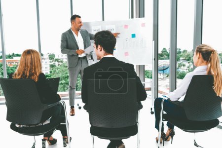 Photo for Businesswomen and businessmen attending group meeting conference in office room. Corporate business team concept. uds - Royalty Free Image