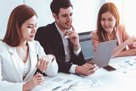 Photo for Businessman is in meeting discussion with colleague businesswomen in modern workplace office. People corporate business team concept. uds - Royalty Free Image