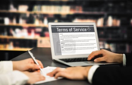 Photo for Online term of service conditions showing savvy rules and regulations in using the website on a laptop computer screen for users to make an agreement - Royalty Free Image