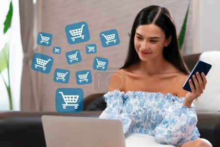 Photo for Customer wearing blue dress control device choosing online platform. Smart consumer watching gadget opening e-commerce application using credit card, cashless technology shopping inventory. Cybercash. - Royalty Free Image
