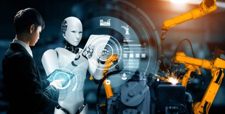 Foto de MLP Robot industrial mecanizado y trabajador humano trabajando juntos en la futura fábrica. Concepto de inteligencia artificial para la revolución industrial y el proceso de fabricación de automatización. - Imagen libre de derechos
