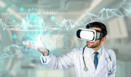 Photo for Professional doctor wearing lab coat and VR headset while looking at hologram of human organ. Skilled researcher looking and thinking about medical theory. Innovation. Blurring background. Deviation. - Royalty Free Image