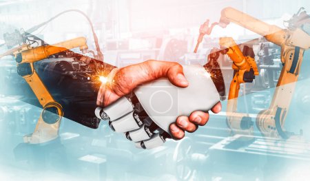 Foto de MLP Robot industrial mecanizado y trabajador humano trabajando juntos en la futura fábrica. Concepto de inteligencia artificial para la revolución industrial y el proceso de fabricación de automatización. - Imagen libre de derechos
