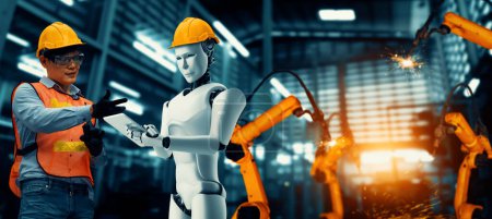 Photo for MLP Mechanized industry robot and human worker working together in future factory. Concept of artificial intelligence for industrial revolution and automation manufacturing process. - Royalty Free Image