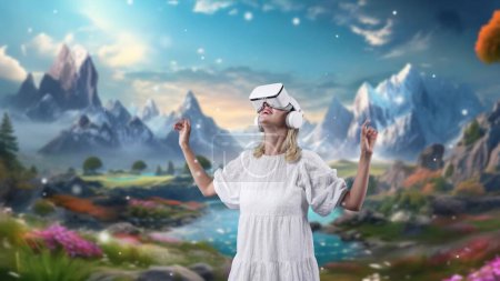 Photo for Impressive woman looking around through VR in fairytale forest mountain ice of wonderland snowfall landscape getting fresh air in meta magical world fantasy jungle creativity in winter. Contraption. - Royalty Free Image